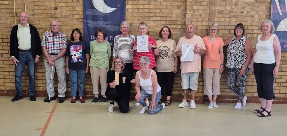 Silver Strength award and certificate presentation with class members